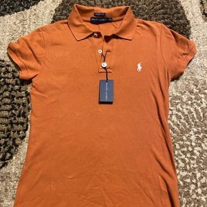 Skinny fit polo. Never worn. Too tight for me.